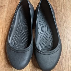Black Crocs flats